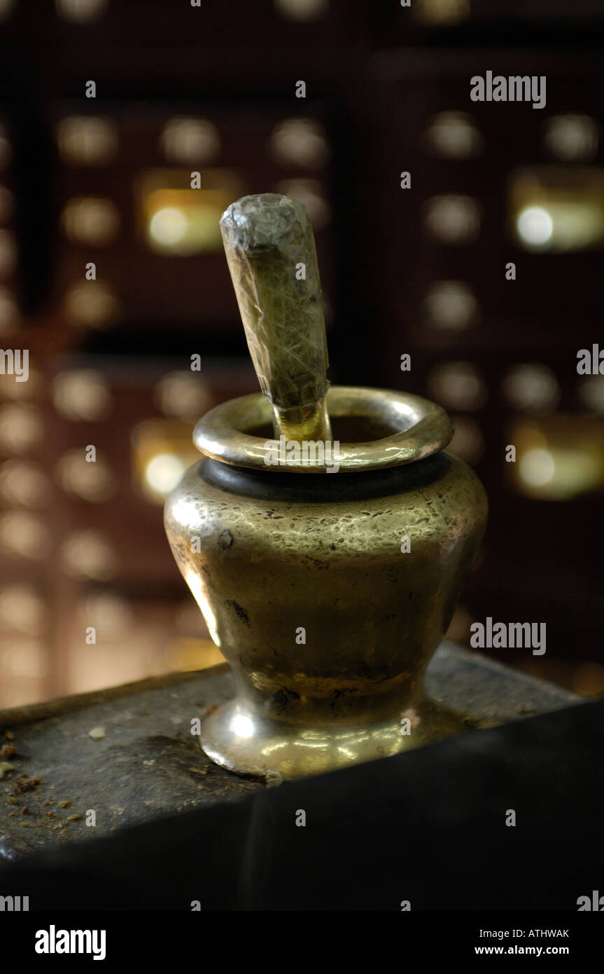 Brass Pestle and Mortar in Baitasi pharmacy, Beijing, China. 26-Feb-2008 Stock Photo