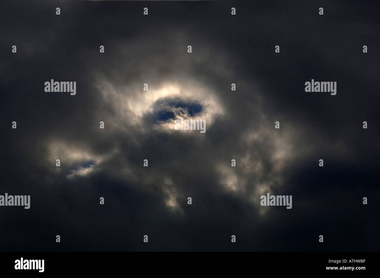 Natural Cloud Formations That Look Like The Portrait Of A Bird Stock Photo