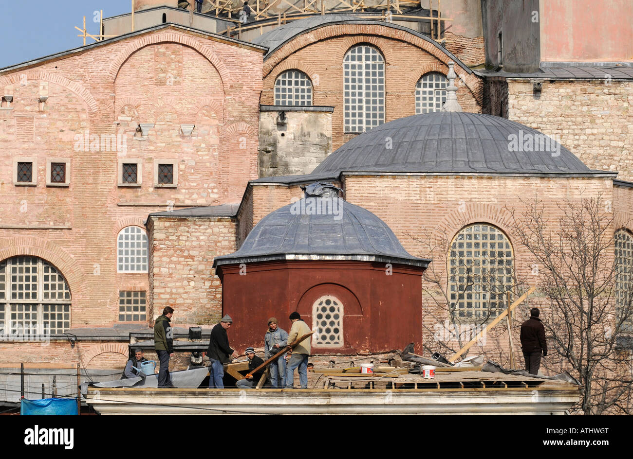 Renovation workers on the roof of Aya Sophia, a major landmark in the sultanahmet district of Istanbul, Turkey. Stock Photo