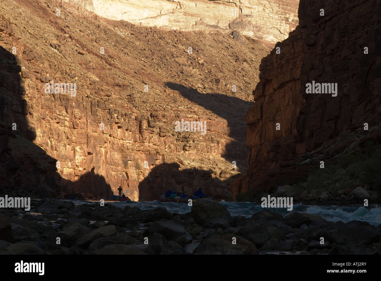 Early morning rafters preparing to run House Rock rapid on the Colorado River in the Grand Canyon National Park Arizona Stock Photo