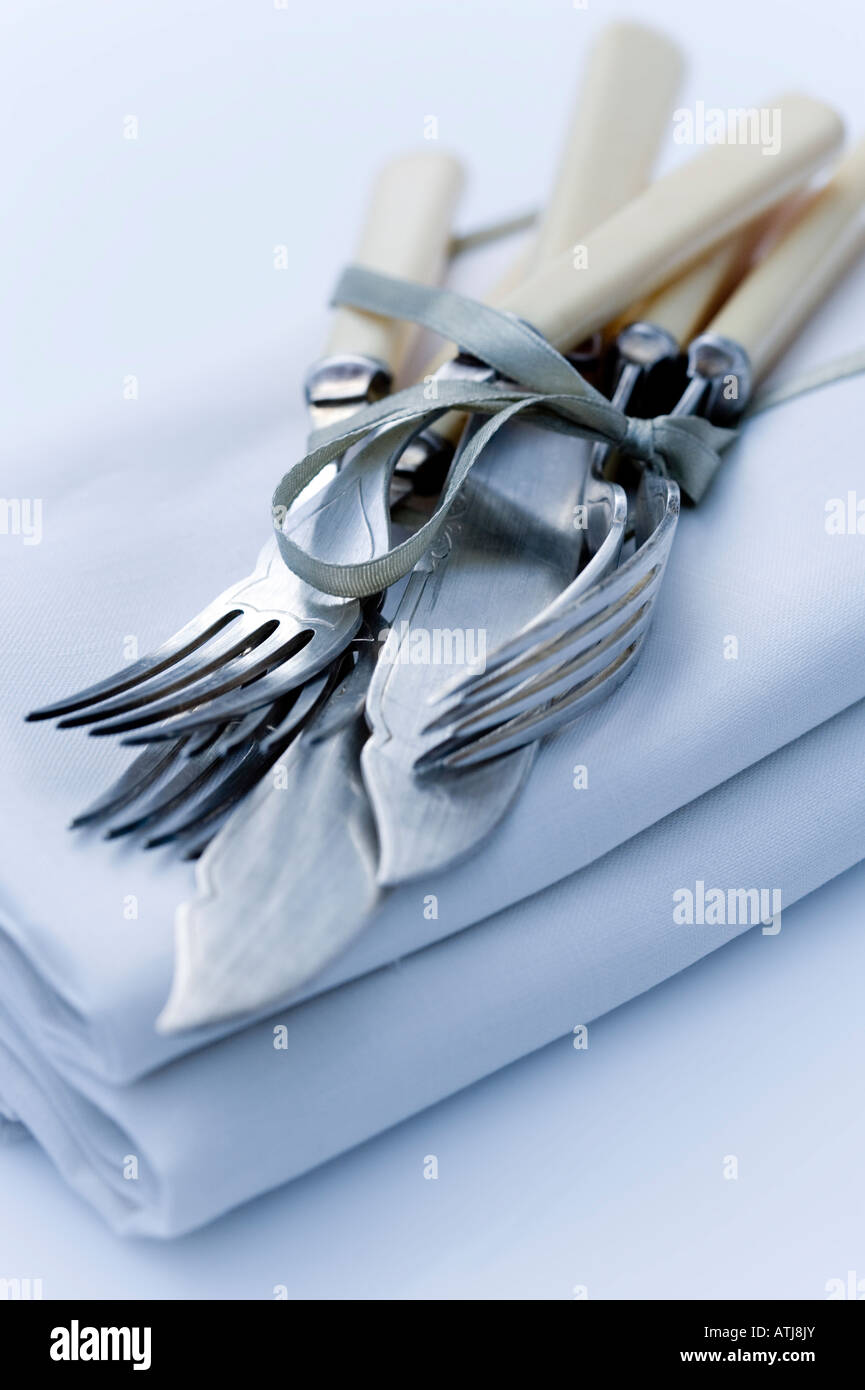 Vintage knives and forks with napkins Stock Photo Alamy