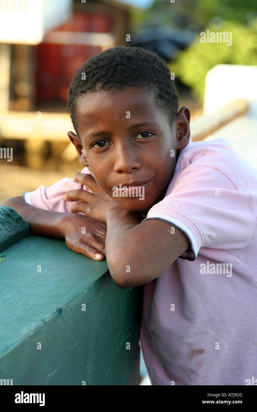Afro-Caribbean child in Utila Town, Utila, one of Honduras' Bay Islands, a favorite destination for low budget divers. Stock Photo