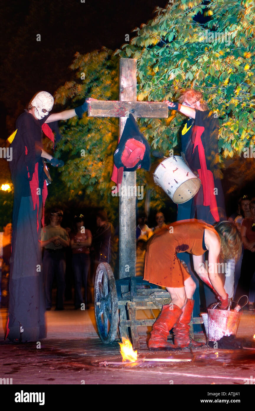 Performance of public execution crucifixion of Witch Stock Photo
