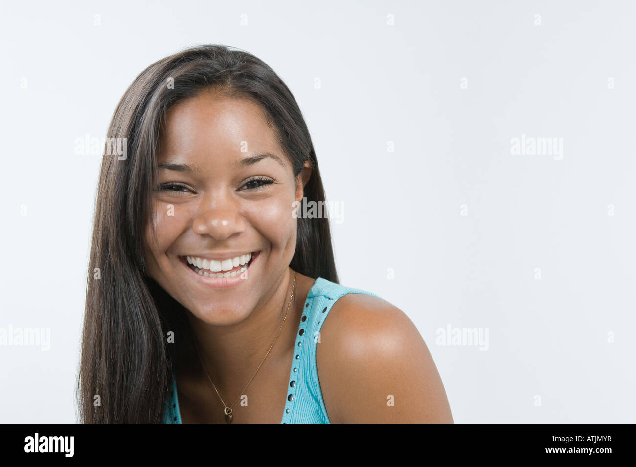 Portrait of a teenage girl smiling Stock Photo - Alamy