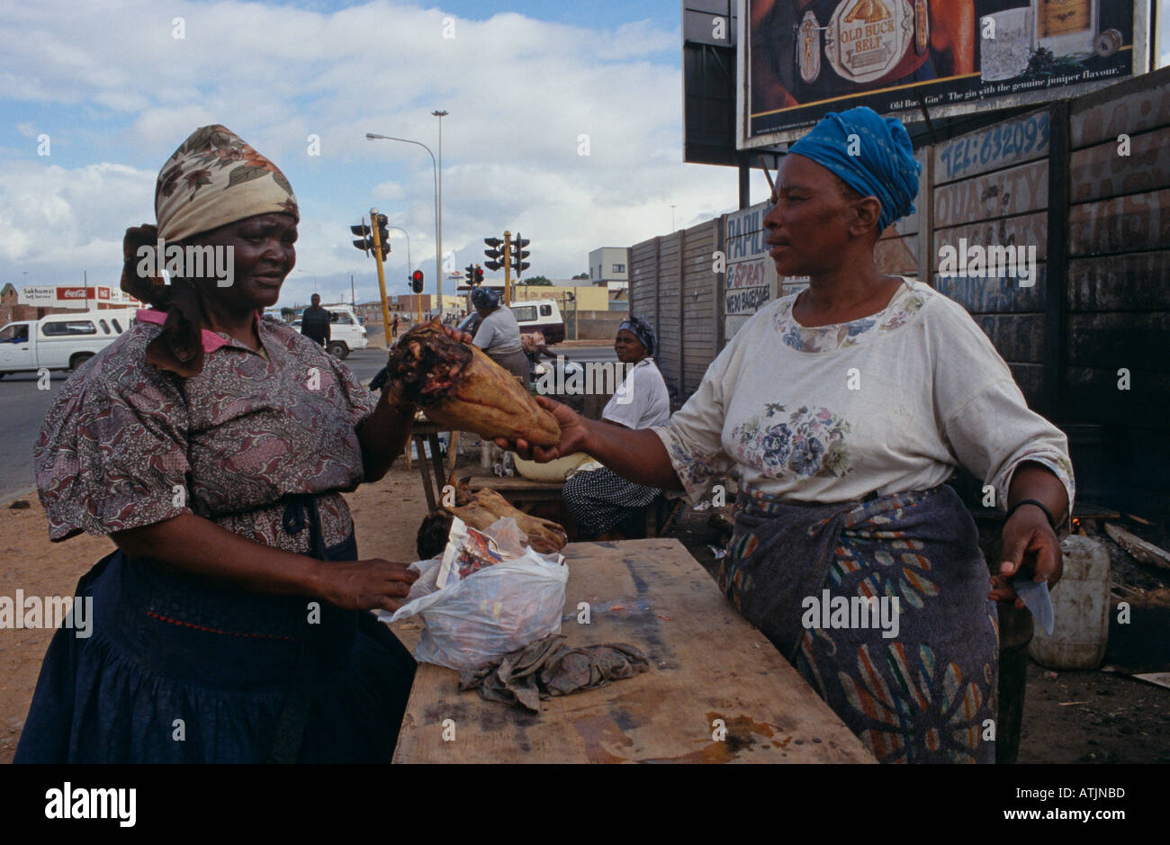 Hawkers and customer in Soweto market, South Africa Stock Photo