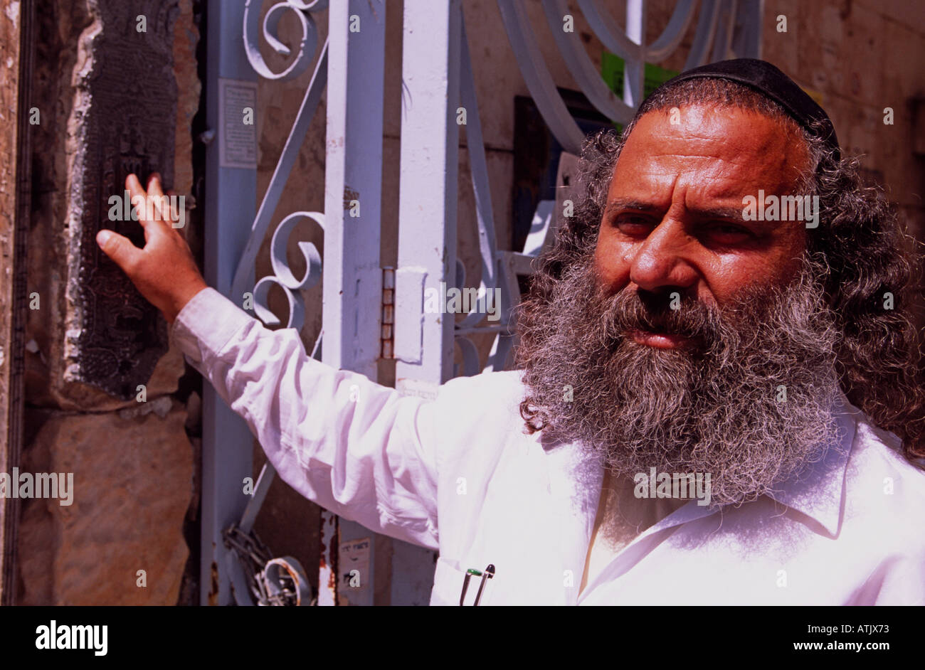 Man Rabbie Man touching mezuzah outside jewish hi-res stock photography and images ...