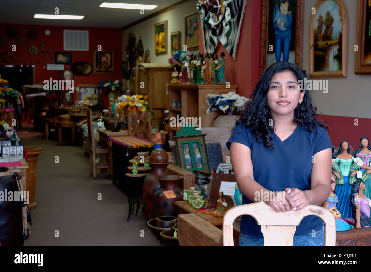 Portrait of female business owner in mexican furniture store Stock