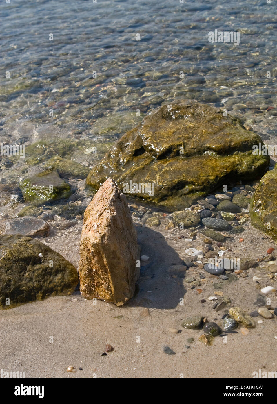 Clear Sea Rocks Rocks in clear Mediterranean sea waters off the sandy beaches French ...