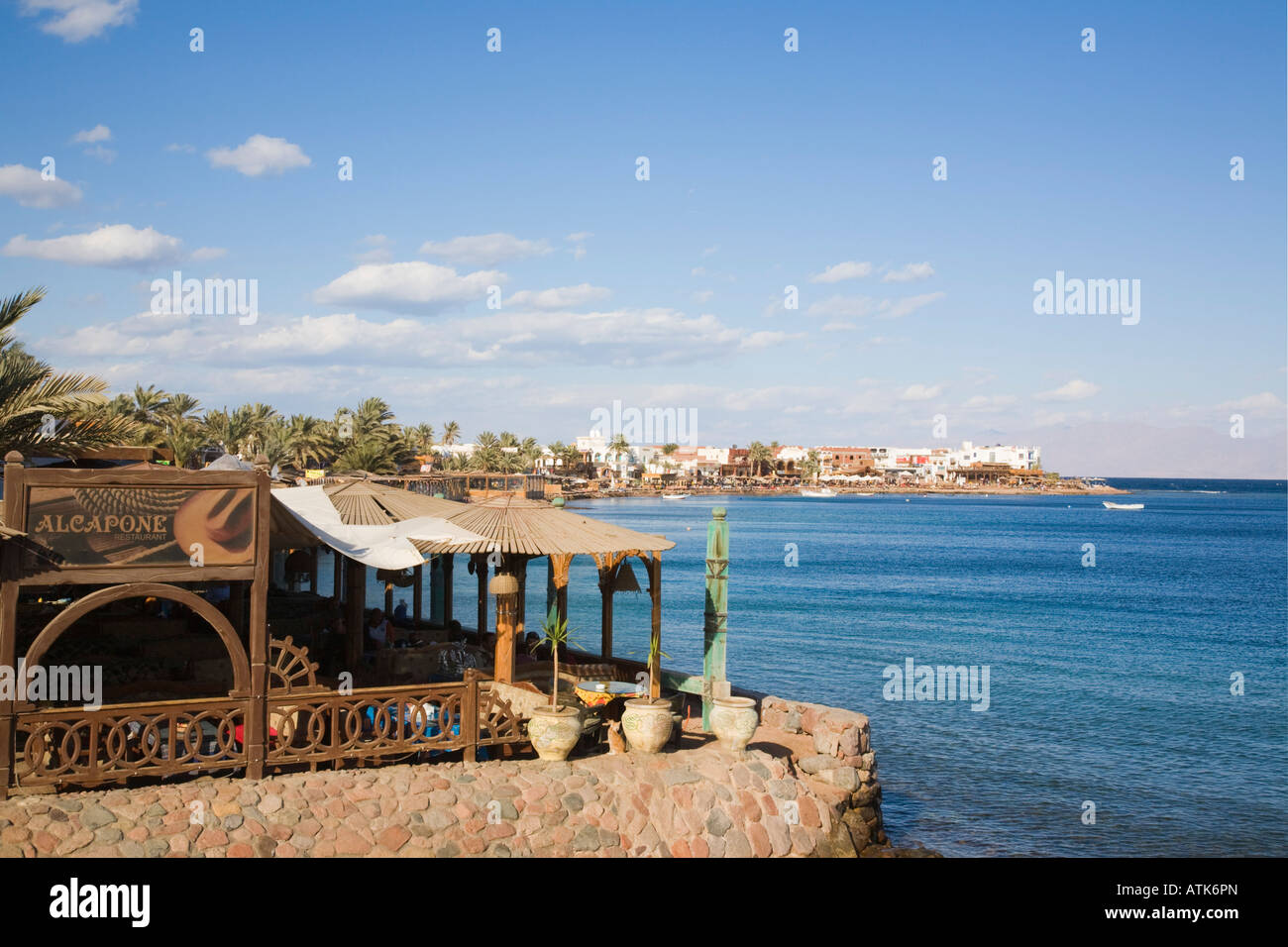 Dahab Sinai Egypt Waterfront restaurant cafe overlooking bay in seaside resort on Red Sea east coast Stock Photo