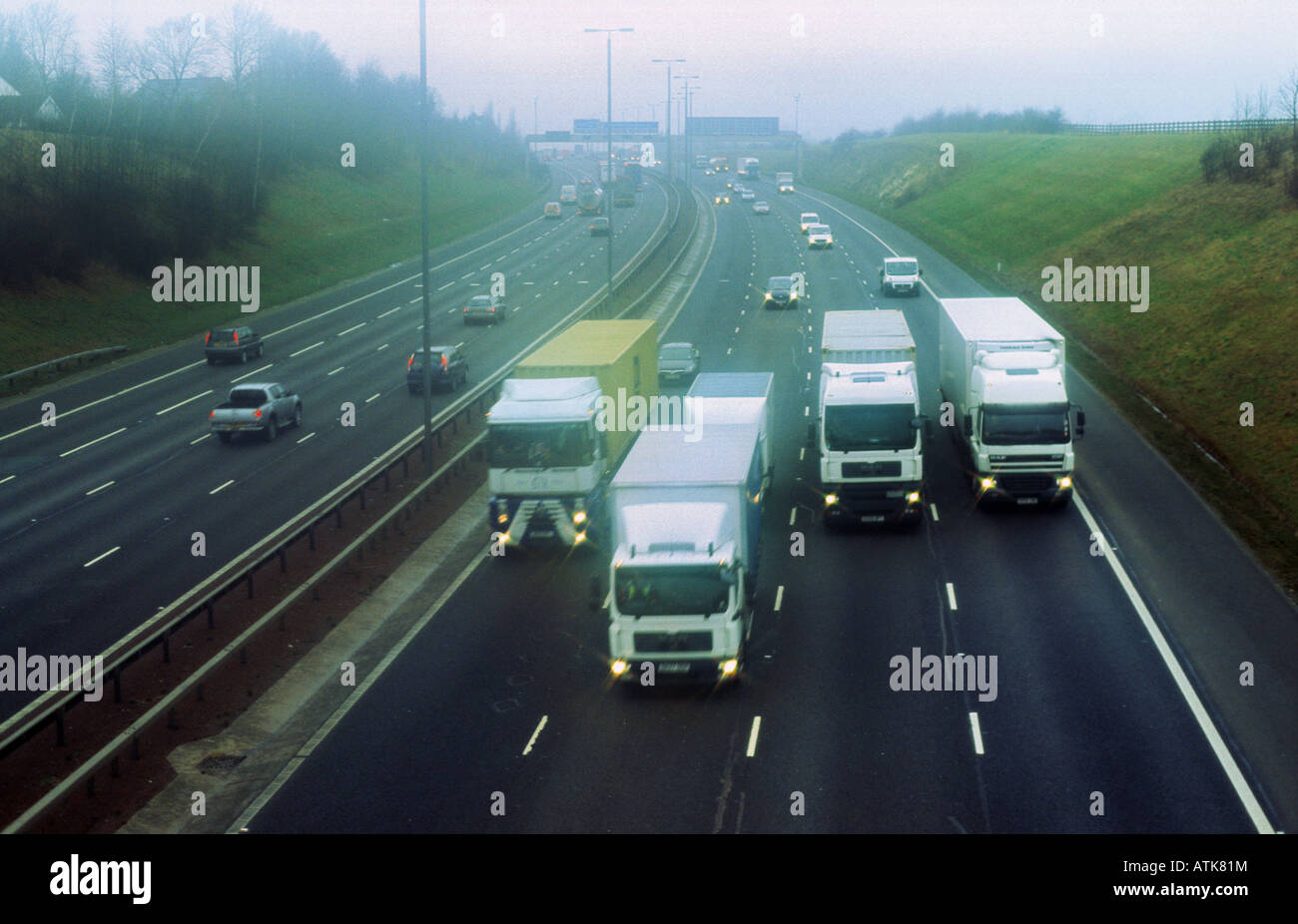 lorries travelling on the A1 M1 motorway Leeds Yorkshire UK Stock Photo