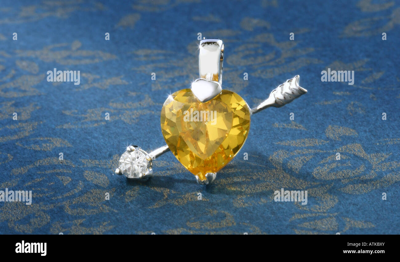 a heart shape topaz and platina arrow jewelry Stock Photo