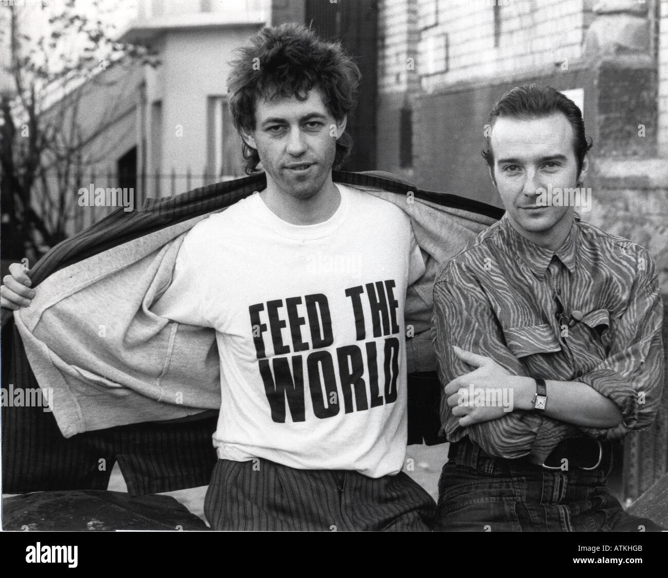 BAND AID Bob Geldof left and Midge Ure in 1984 promoting the charity Stock Photo