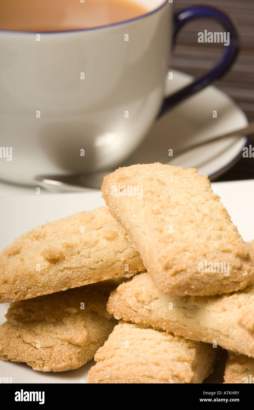 Scottish shortbread biscuits and cup of tea in background detail Stock Photo