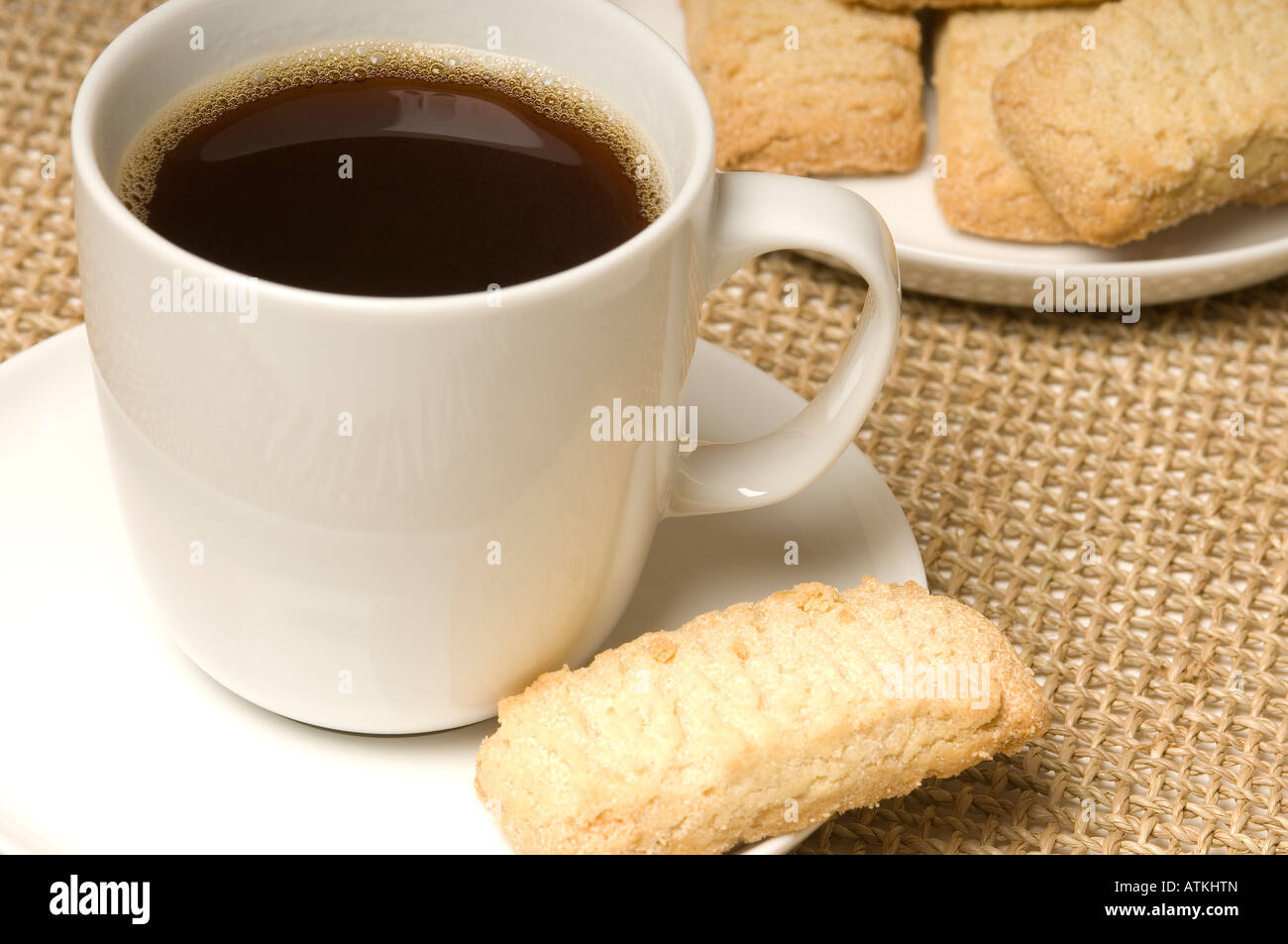 Cup of black coffee and Scottish shortbread biscuits close up Stock Photo