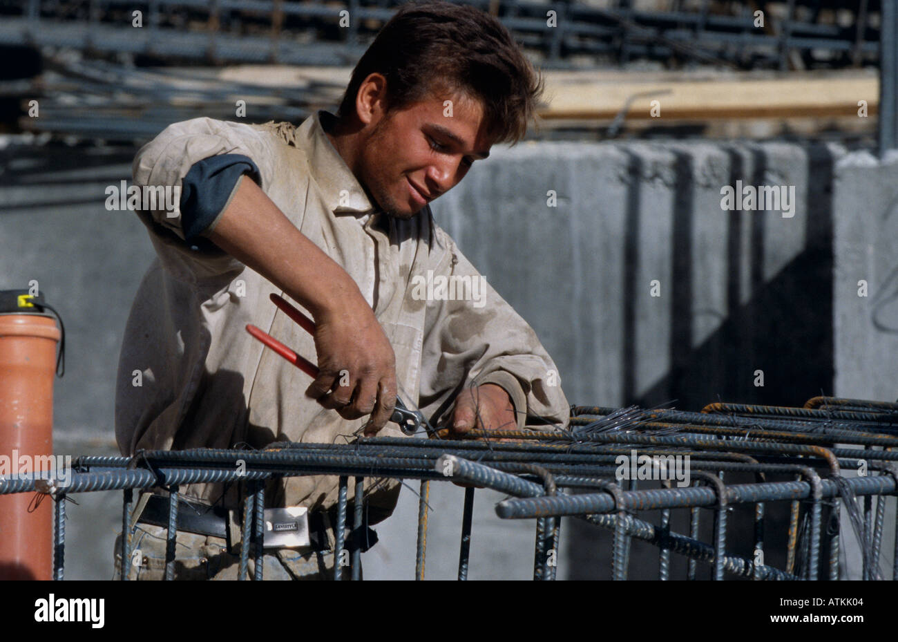 A worker working at a constuction site in Hebron Stock Photo
