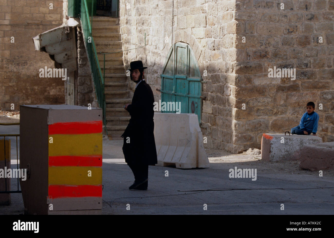 Jewish man walking on street in settlement. Hebron. Stock Photo