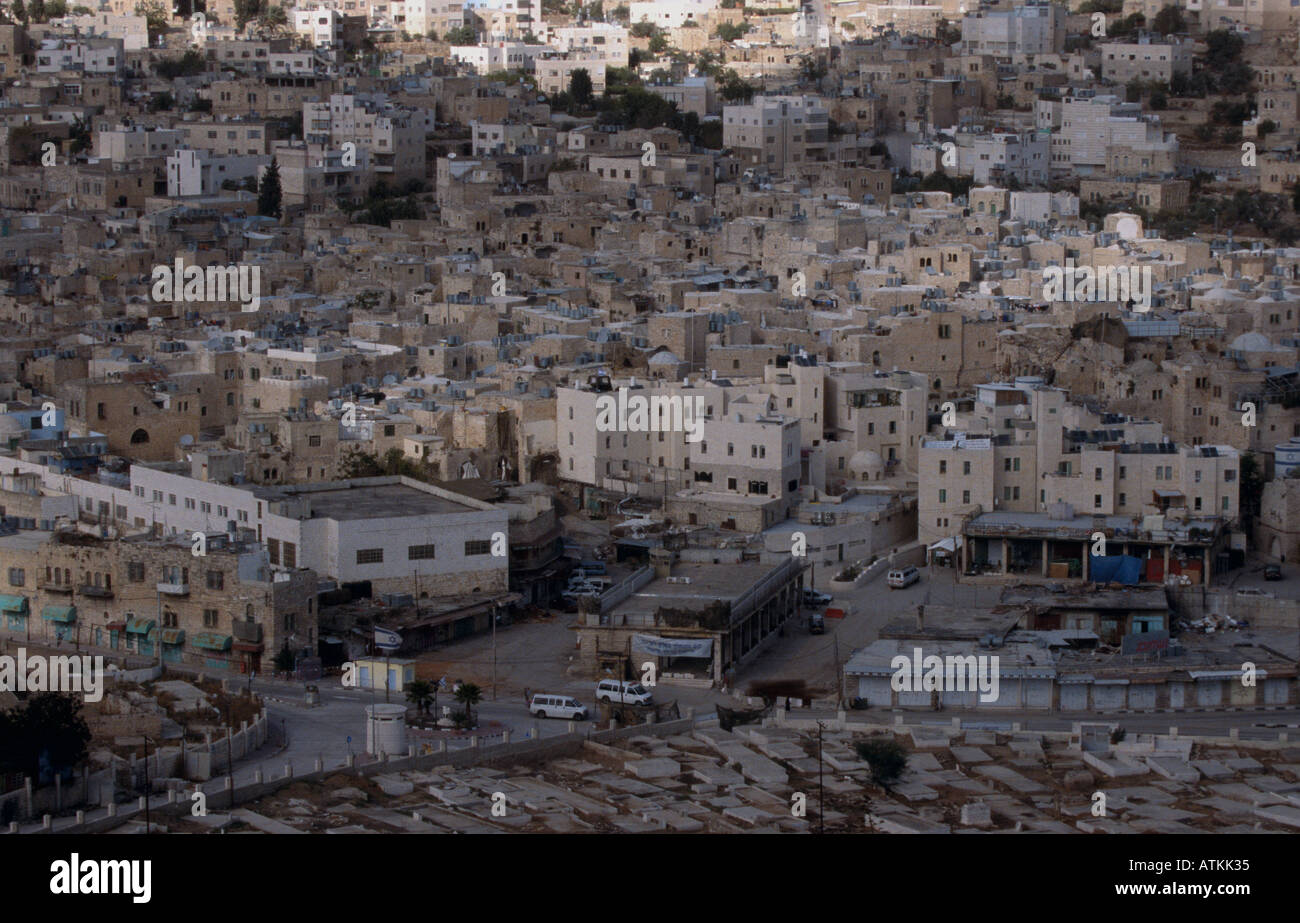 Panorama of Hebron with Jewish settlement in the middle West Bank Stock Photo