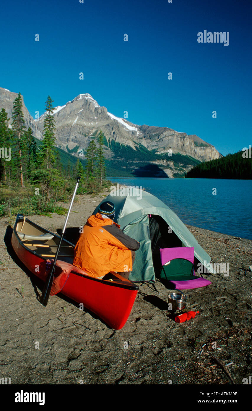 Man with tent at Maligne Lake / Mann mit Zelt am Maligne-See Stock Photo