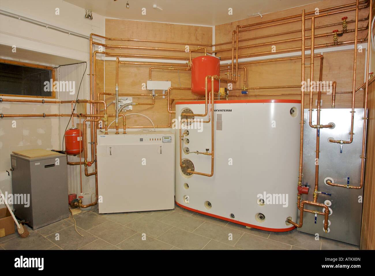 Geo-thermal heat exchanger and hot water tank for a large heating system Stock Photo