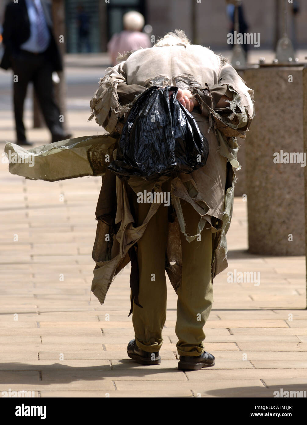 Tramp Homeless Man Walking The Streets In Edinburgh Scotland Stock 