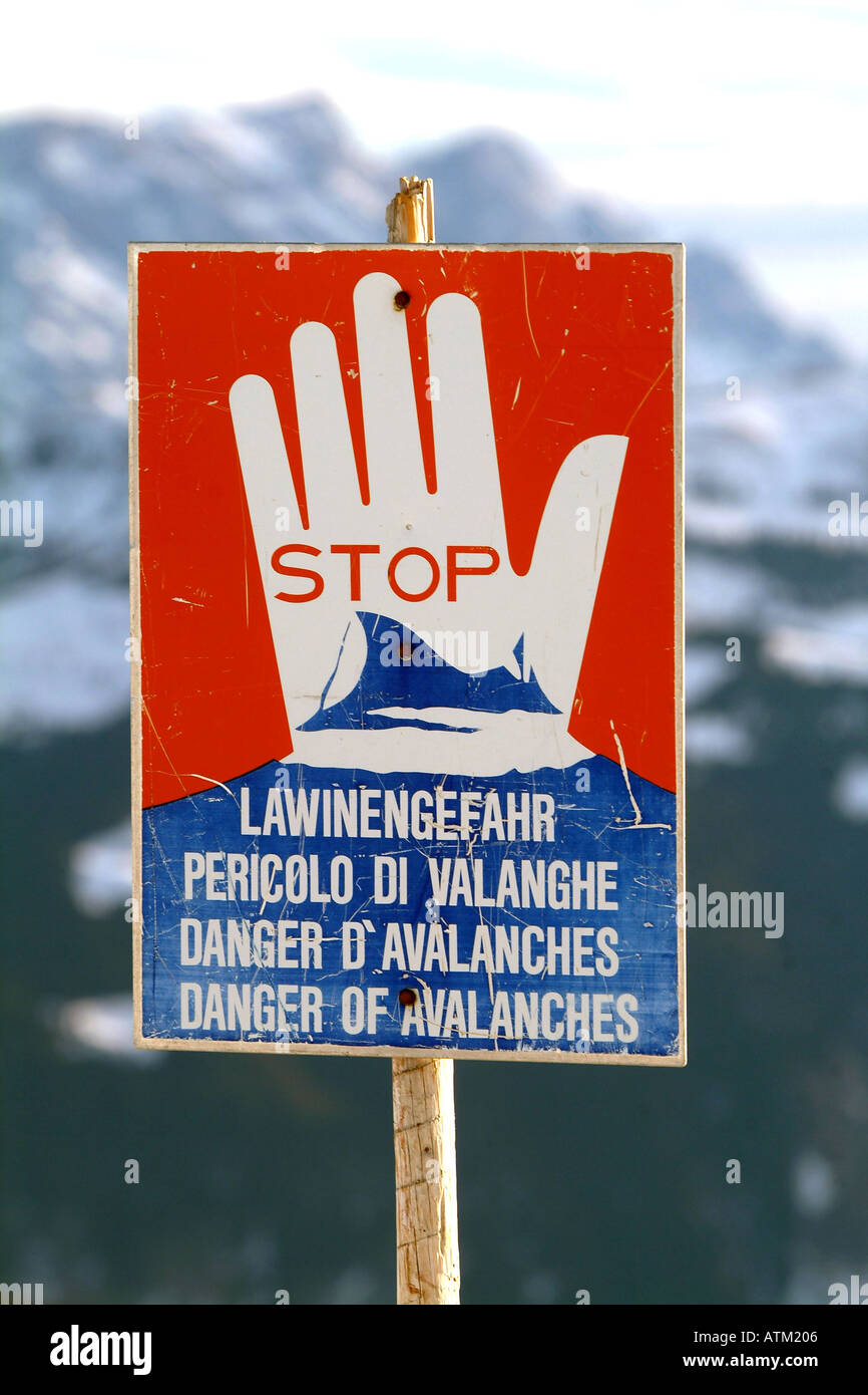 Sign warning of avalanche risk on the Schmittenhohe mountain  Stock Photo