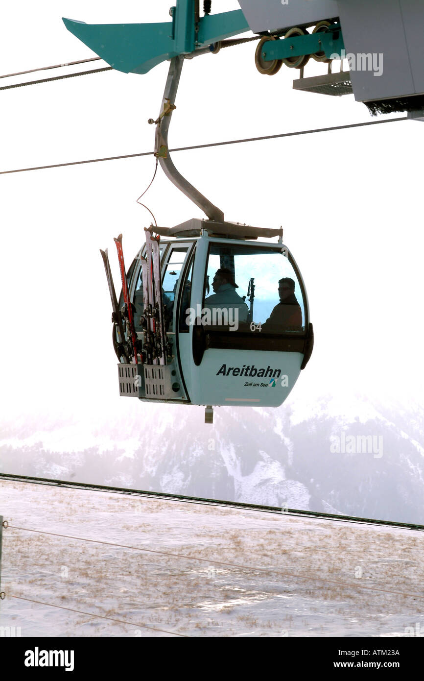Cable car on the pistes of the Schmittenhohe mountain above Zell am See  Stock Photo