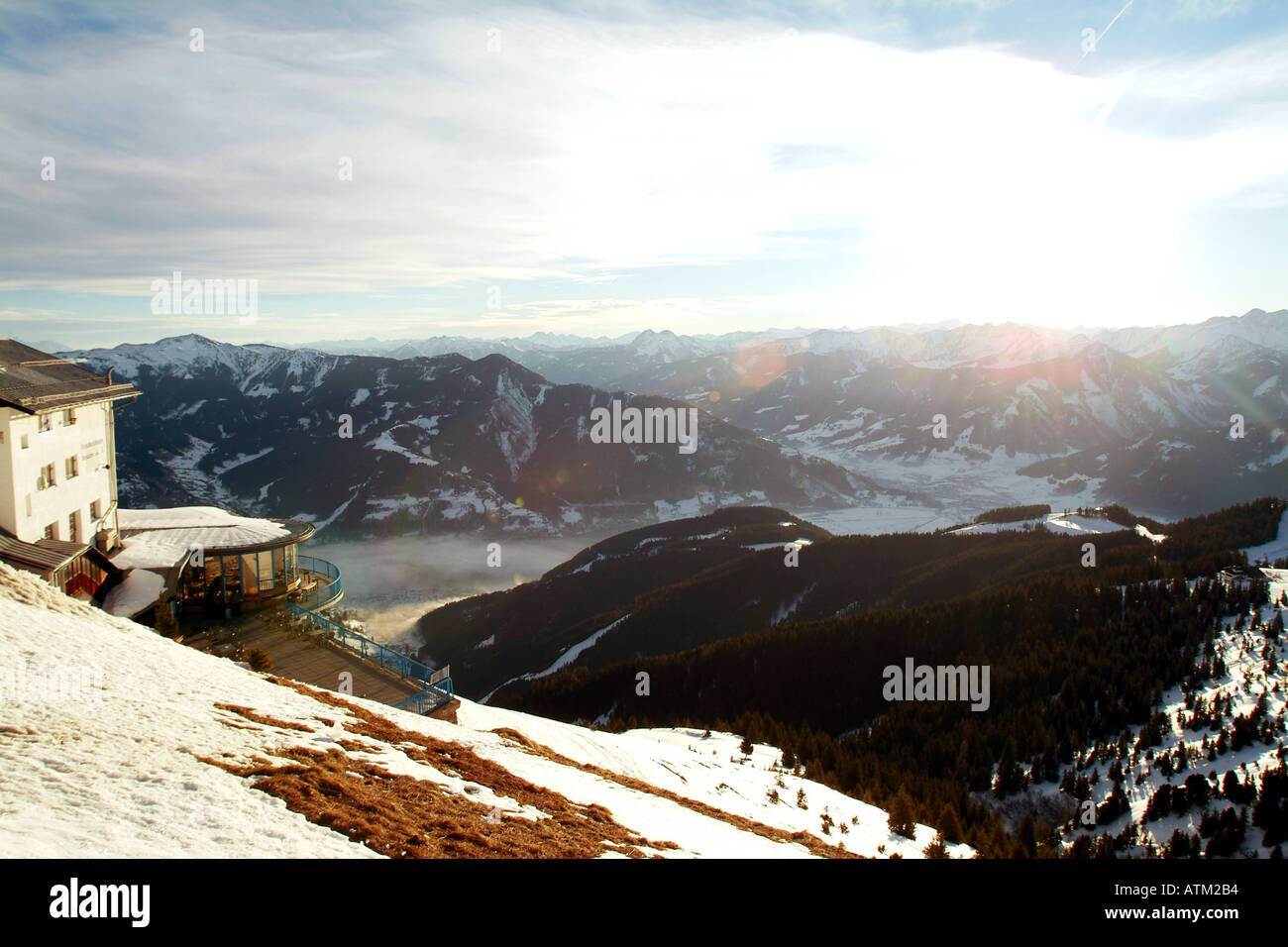 View down over the town and lake of Zell am See from the summit of the Schmittenhohe mountain  Stock Photo