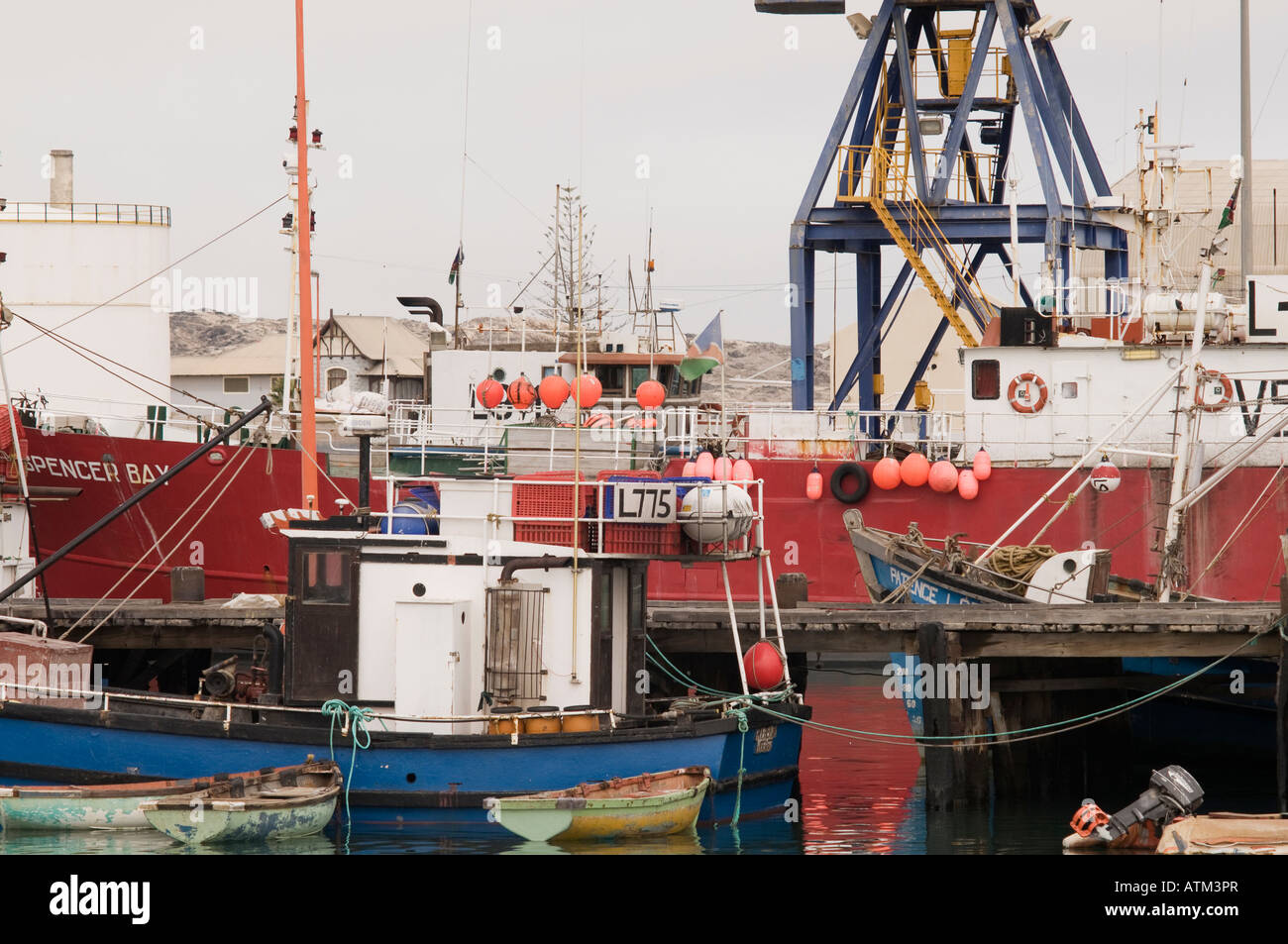 Fishing boats in the Luderitz harbour in Namibia Stock Photo