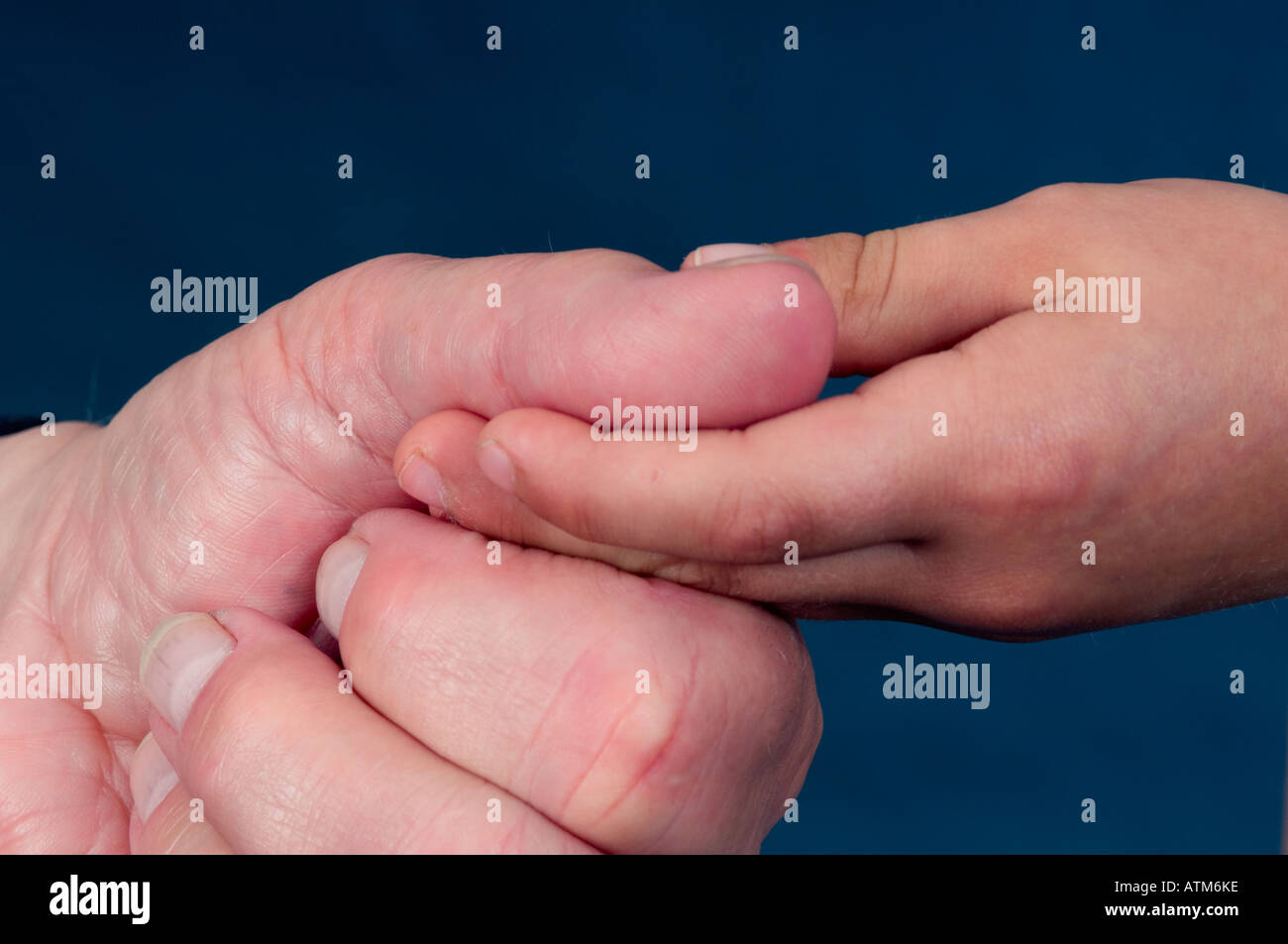 hand of an old man and hand of a child Stock Photo - Alamy