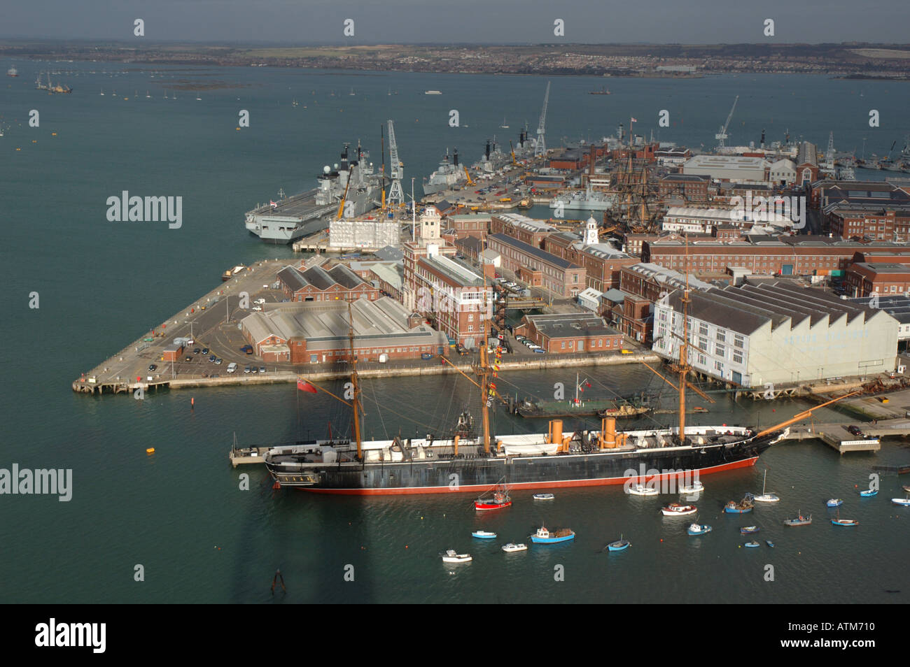 View of Portsmouth Historic Dockyard with HMS Victory and HMS Warrior as seen from the top of the newly built Spinnaker Tower Stock Photo