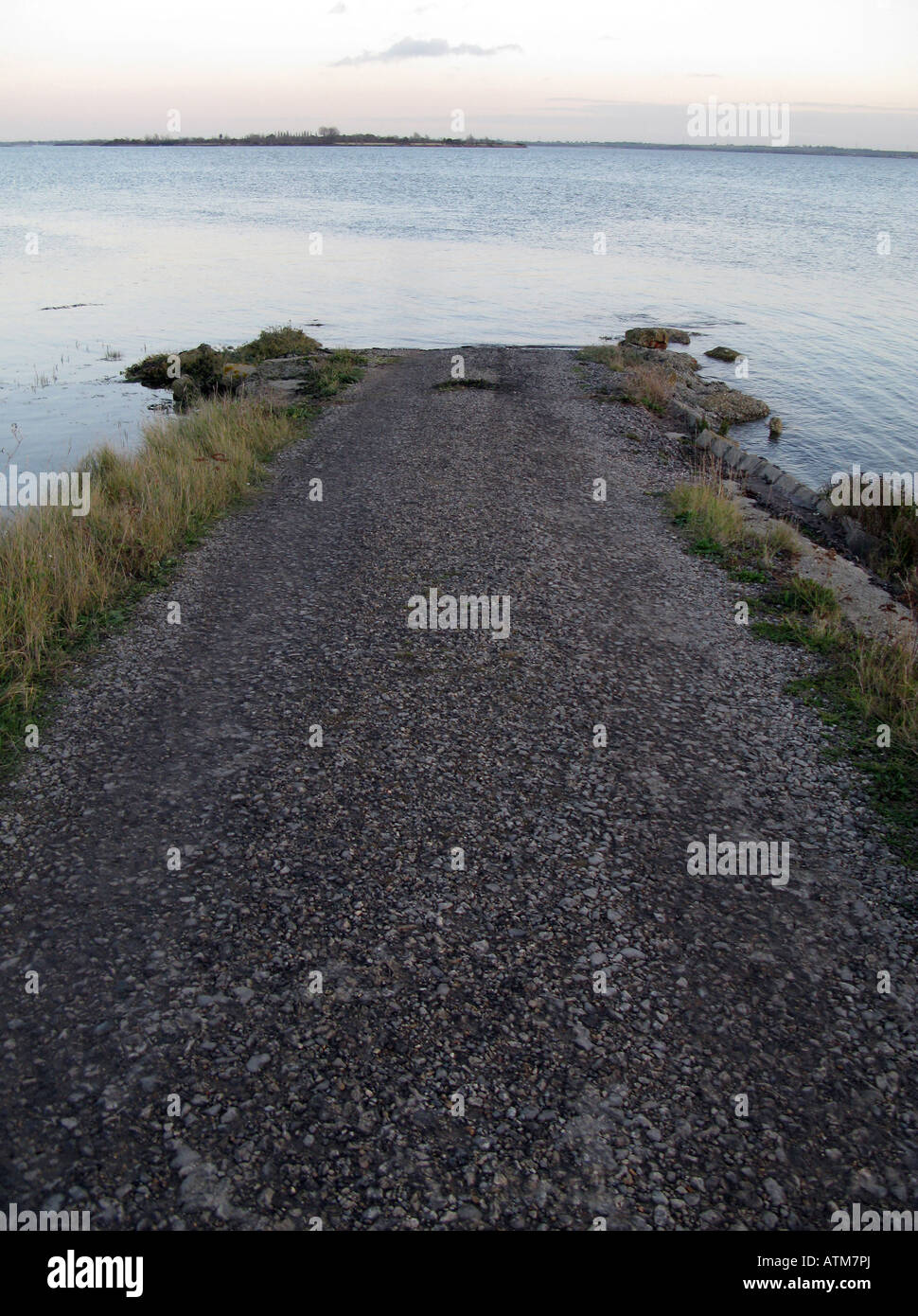 The causeway leading to Osea Island cut off by the sea near Maldon in