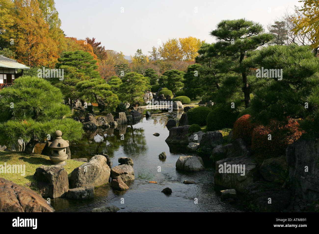 Traditional Japanese garden with stream and water features in the grounds of Nijo Castle Kyoto