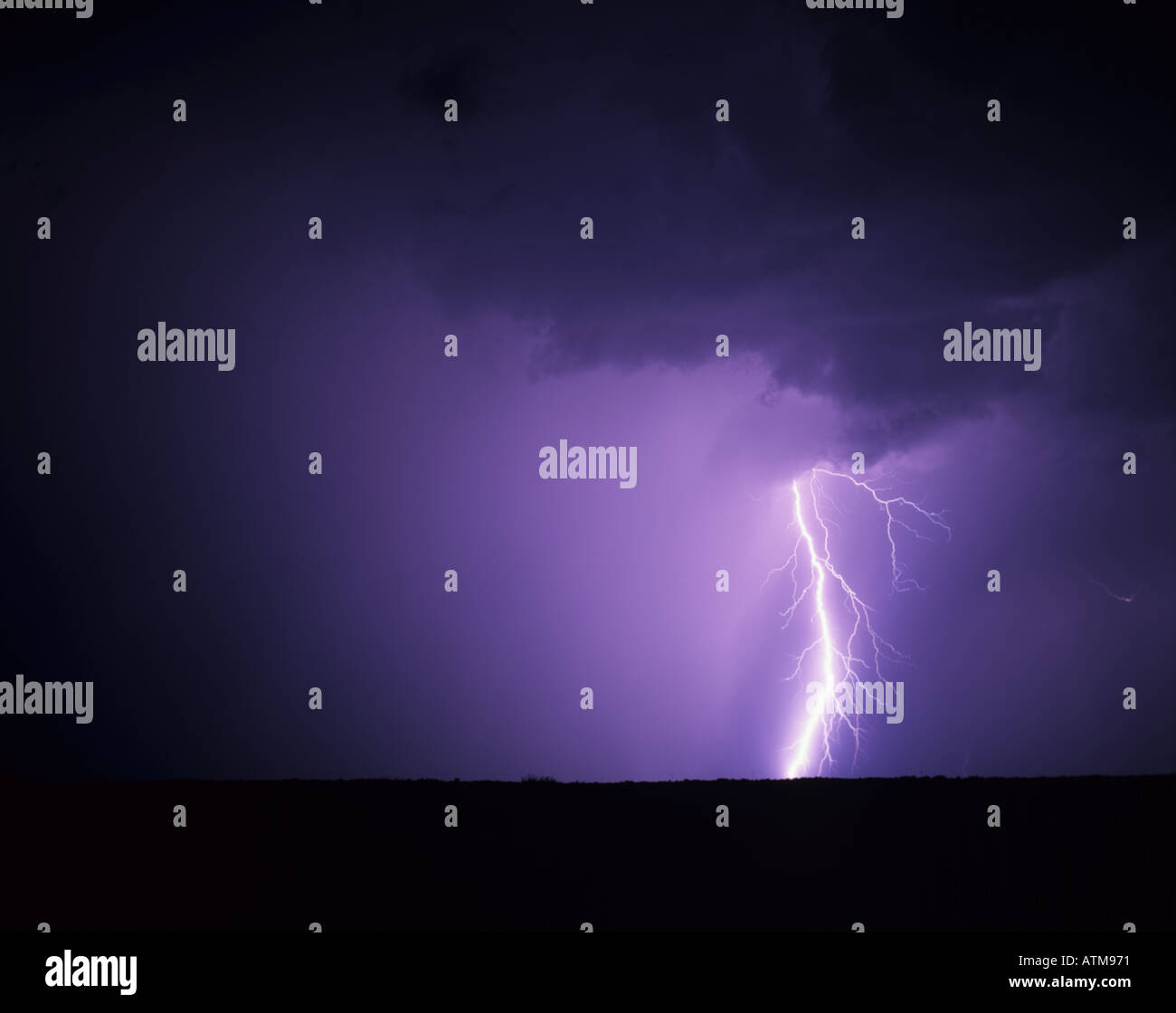 A forked cloud to ground lightning strike from a supercell thunderstorm ...