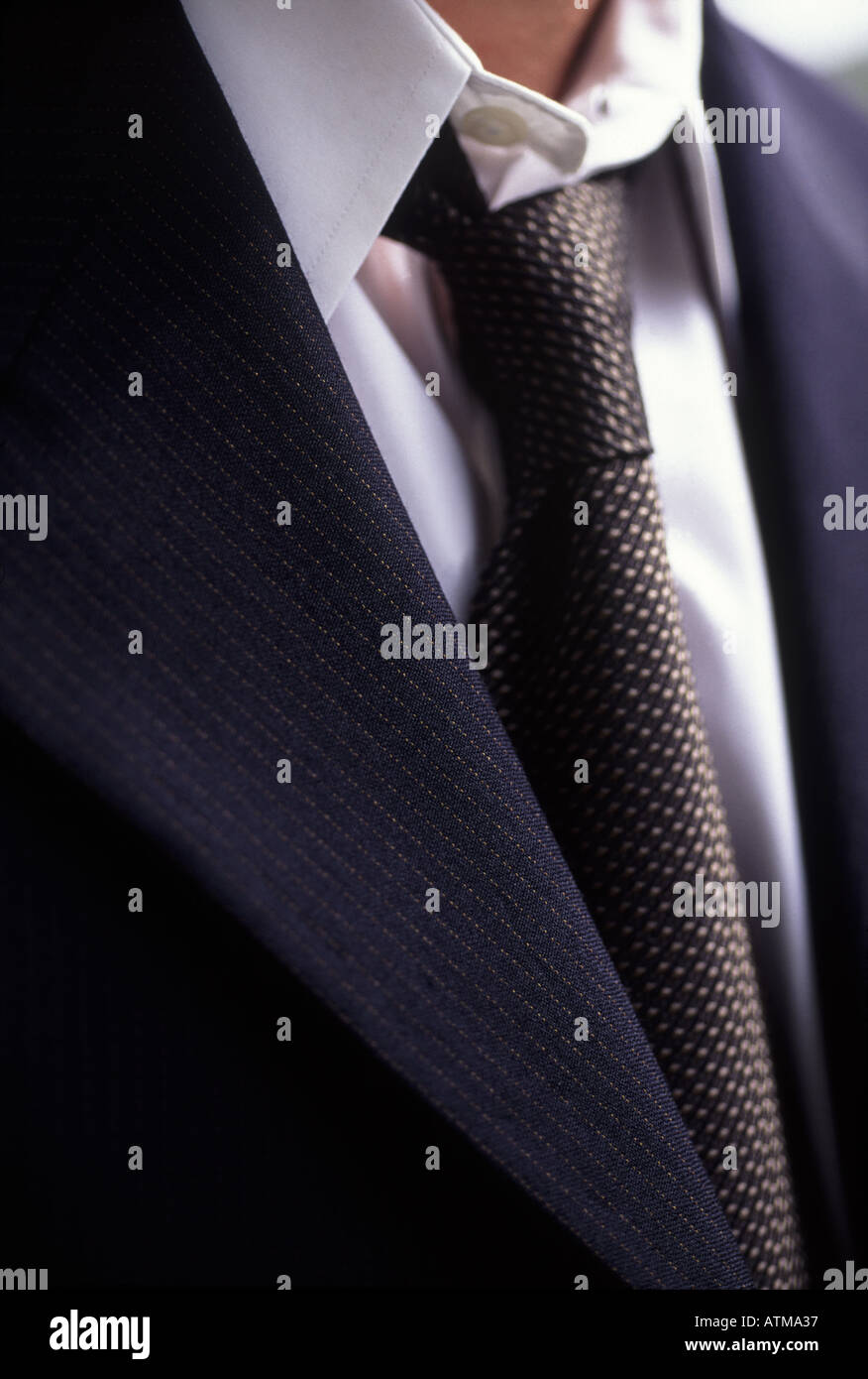 Men's suit and loosened tie white shirt. Stock Photo