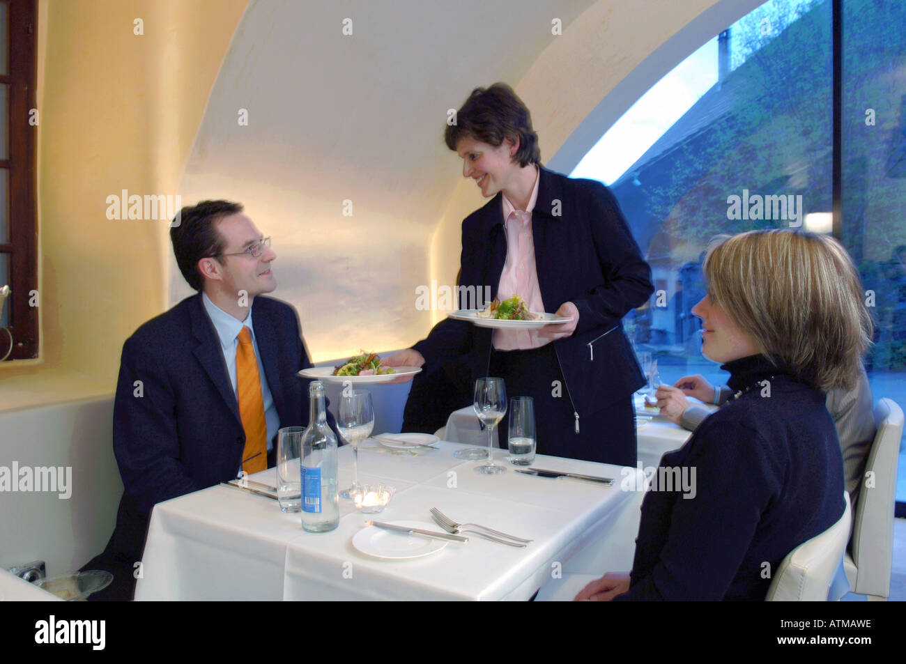 Serving guests in a gourmet restaurant Stock Photo - Alamy
