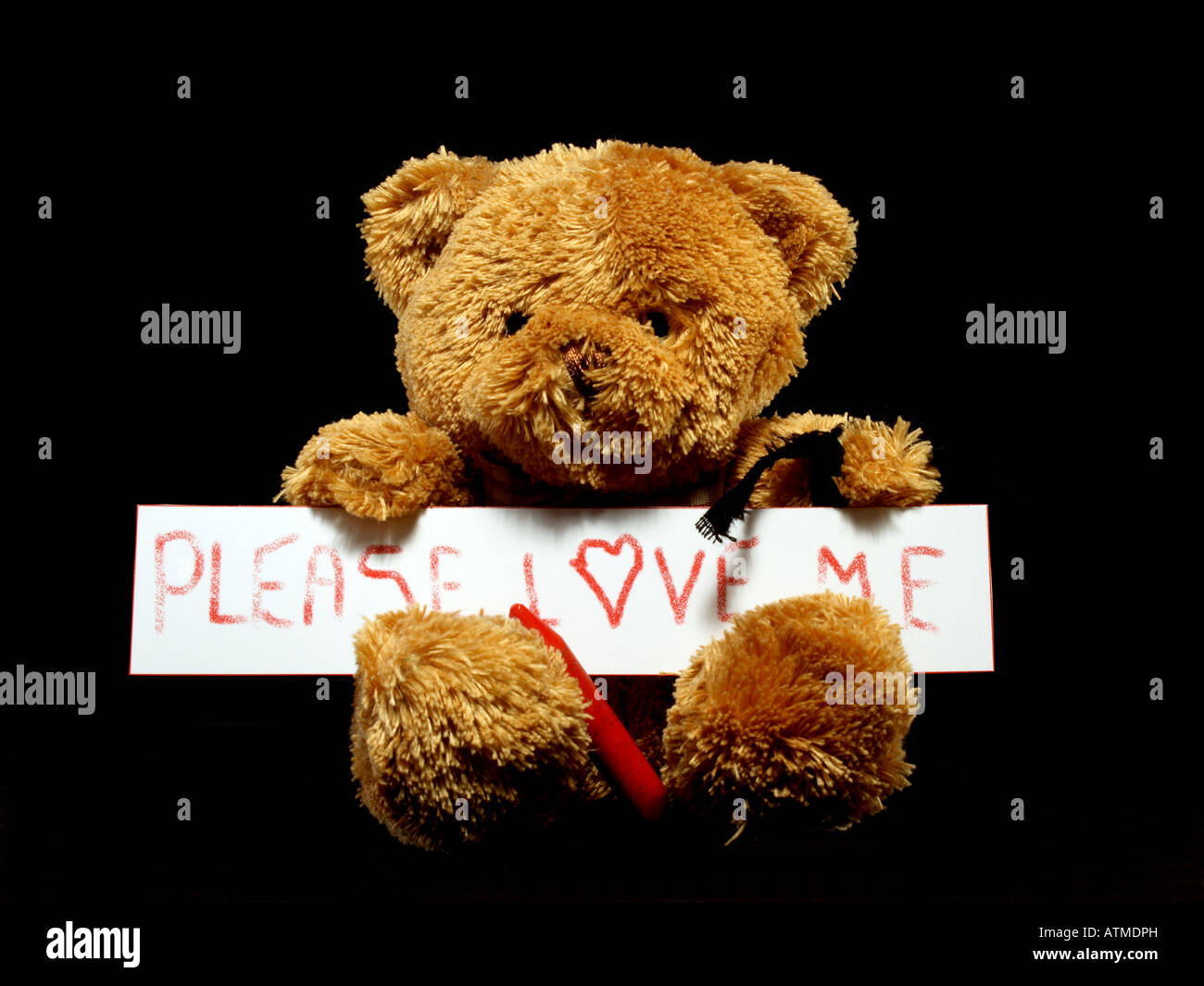 Emo love with teddybear with mourning band Stock Photo