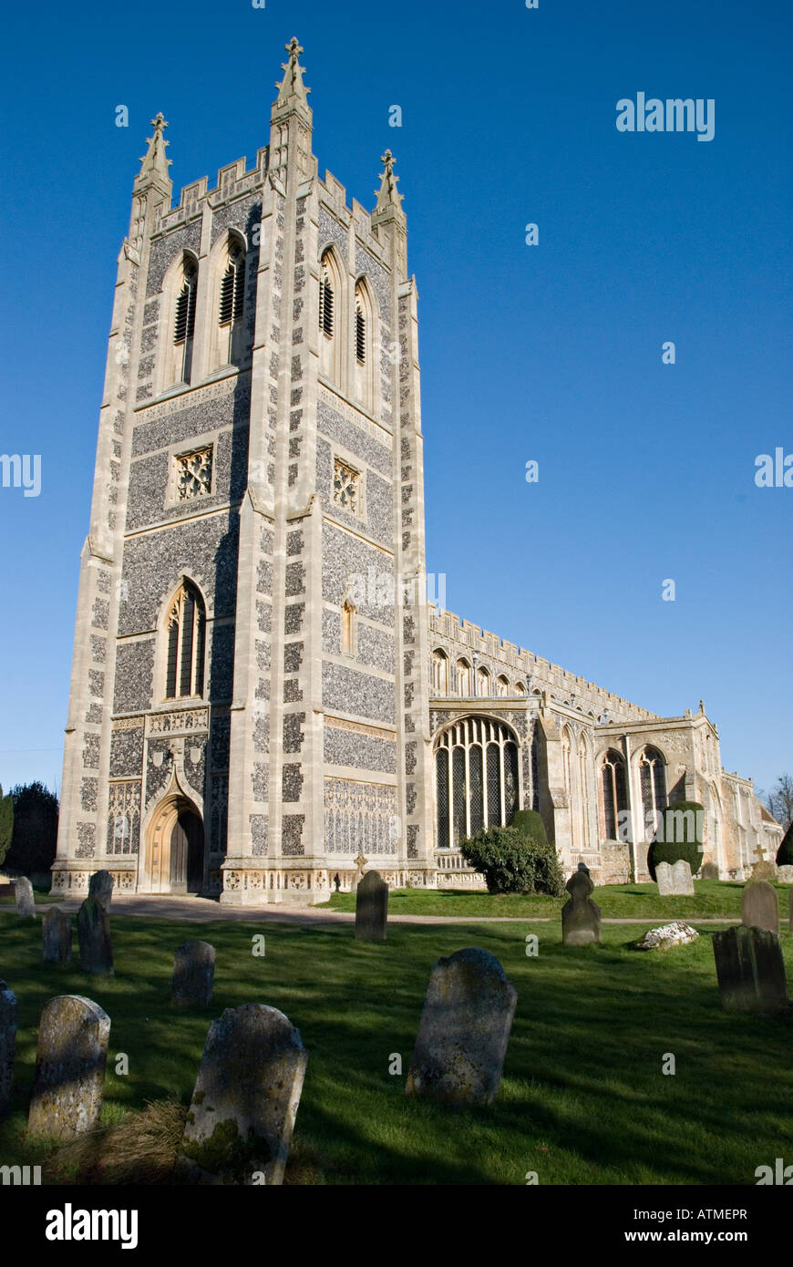 Long Melford, Suffolk, UK. Holy Trinity Church. The tower, added in 1903 to the 15c nave Stock Photo