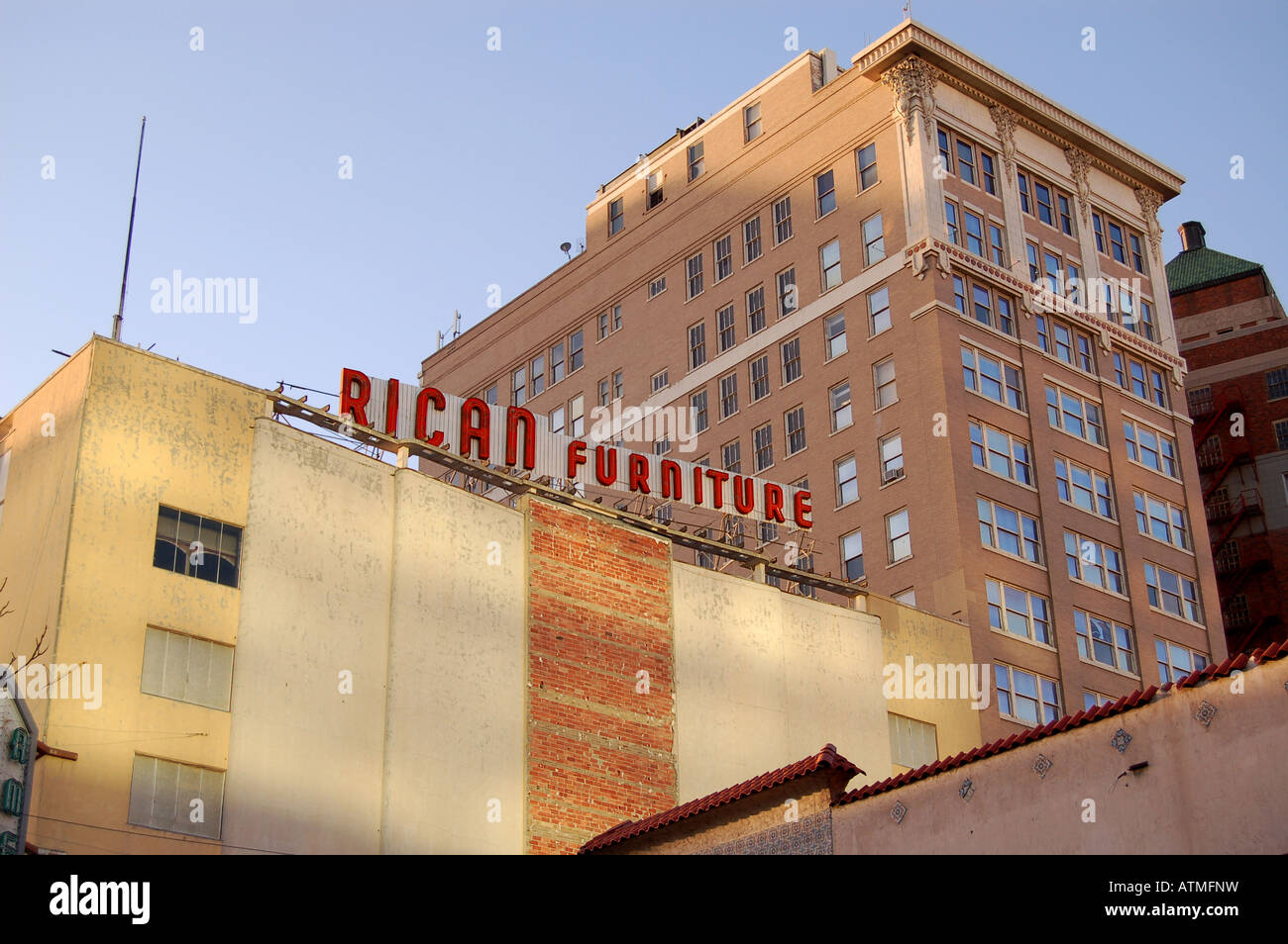 Rican Furniture sign on building roof in downtown El Paso Texas Stock