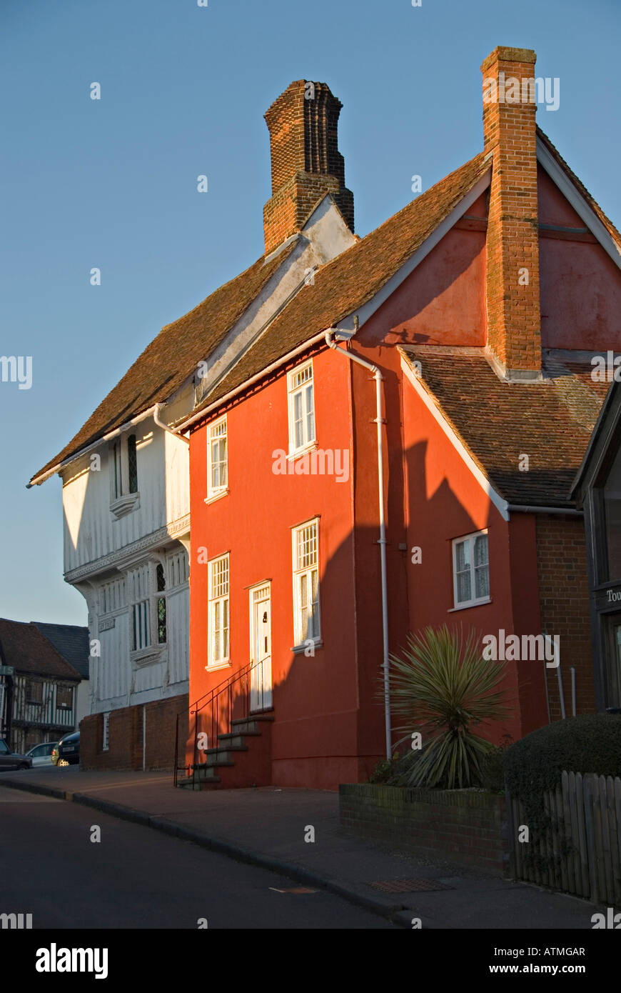 Lavenham, Suffolk, UK. Traditionally limewashed house in evening light Stock Photo