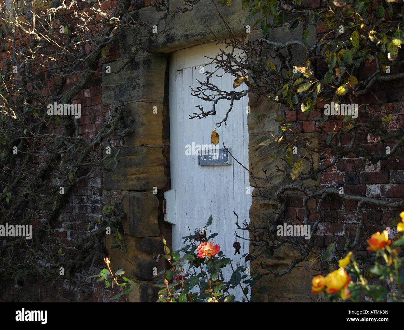Doorway marked no entry in a garden Stock Photo