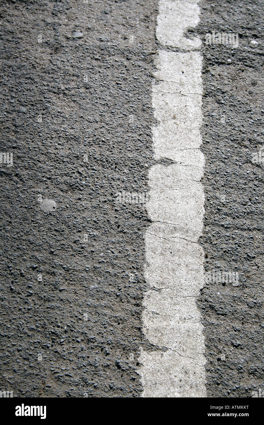 White line on grey tarmac road Stock Photo