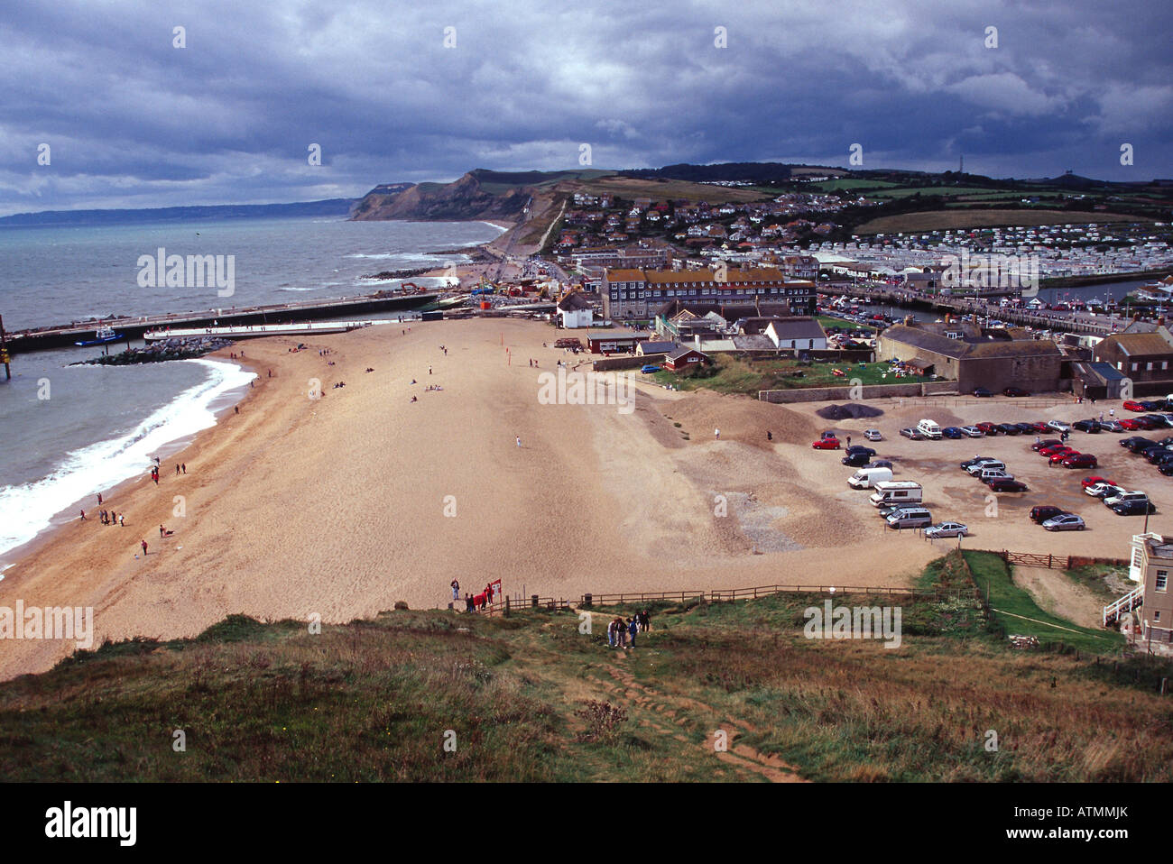 west bay harbour town from east hill viewpoint dorset summer fishing ...