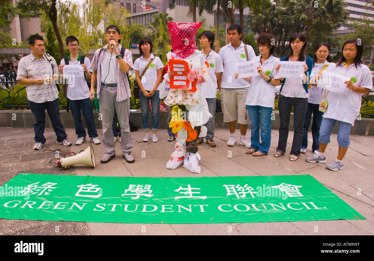 HONG KONG CHINA Plastic Bag Man and students during environmental pollution protest The Green Student Council Stock Photo