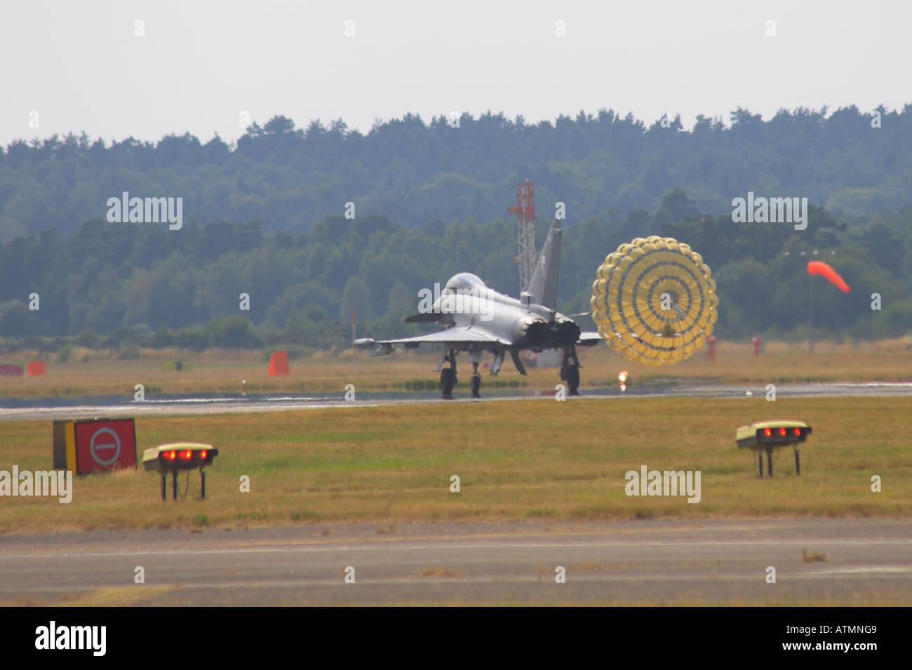 RAF Typhoon Eurofighter landing with parachute fully deployed Stock Photo