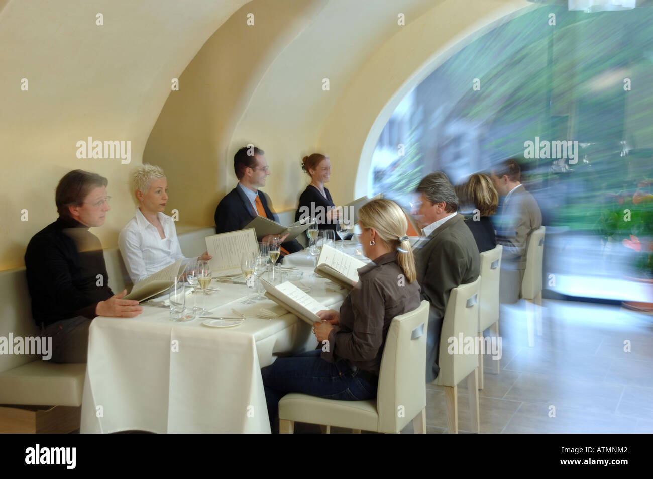 Guests In A Gourmet Restaurant Reading The Menu Stock Photo Alamy