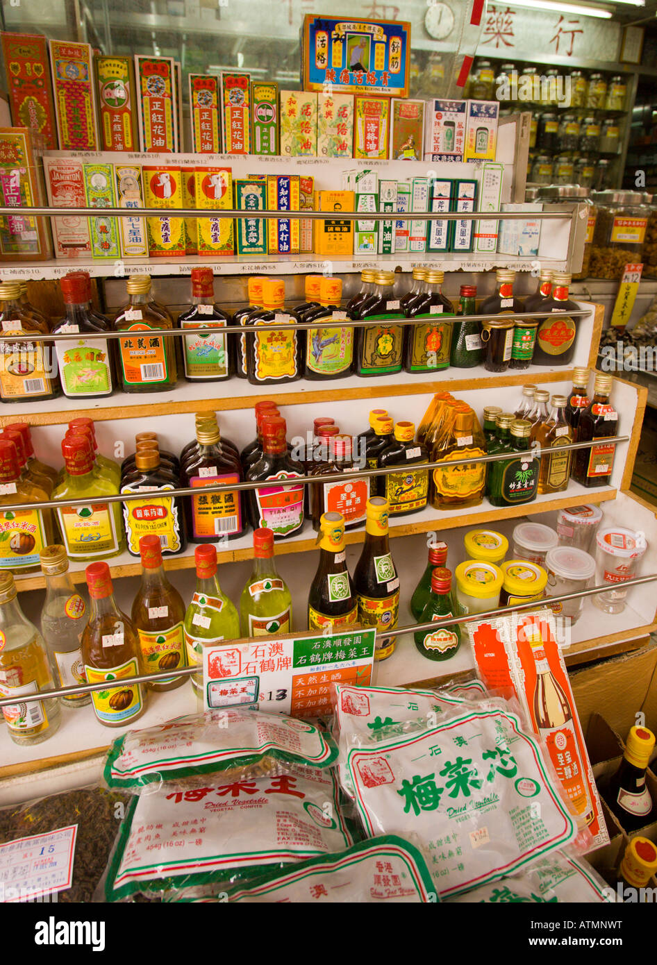 HONG KONG CHINA Close up of products on store shelves including wine spirits and medications in