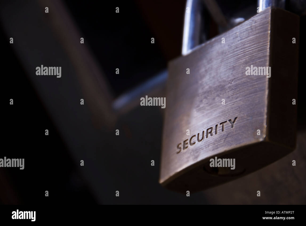 close up shot of a padlock on a metal door Stock Photo - Alamy