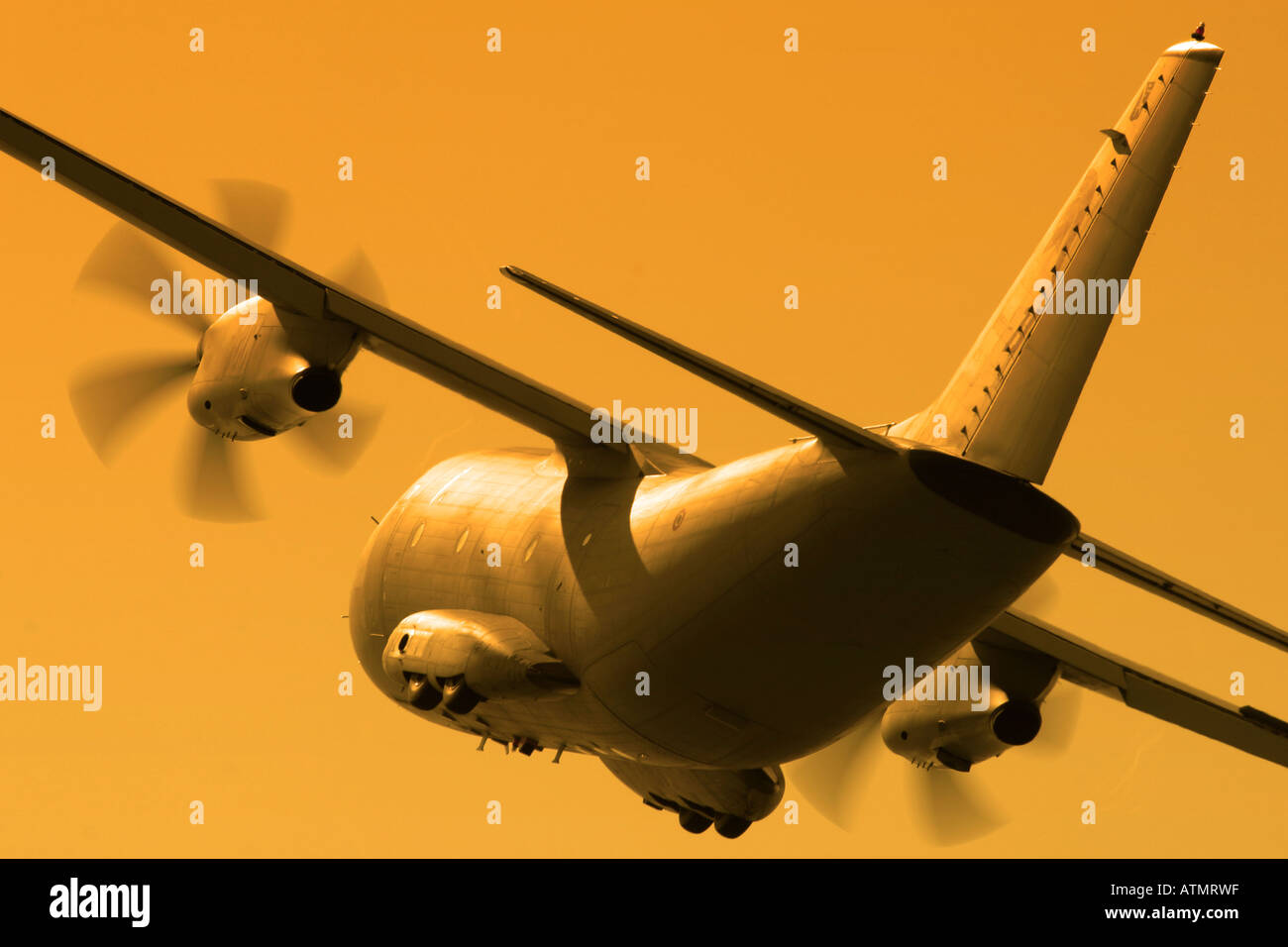 Propeller airplane rear view from below Stock Photo