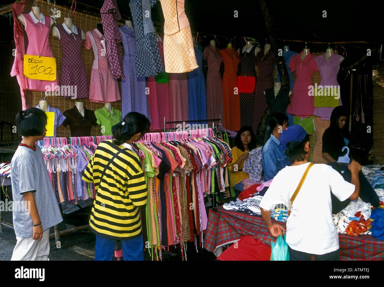 Thai women, shopping, vendor, selling clothes, Chatuchak Weekend Market, Chatuchak Market, Bangkok, Bangkok Province, Thailand, Southeast Asia, Asia Stock Photo