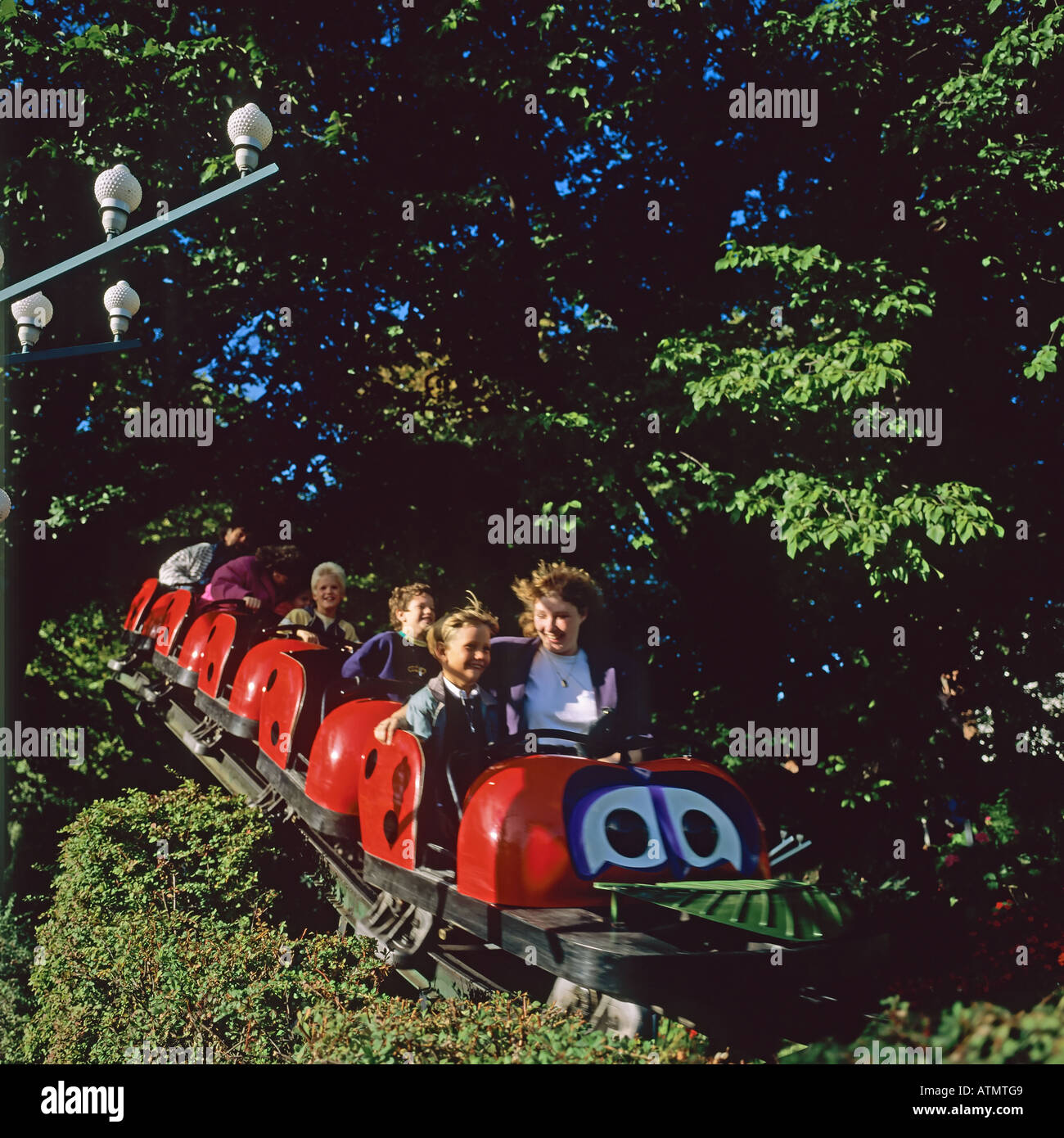 Roller coaster ride, Tivoli gardens amusement park, Copenhagen, Denmark, Europe Stock Photo